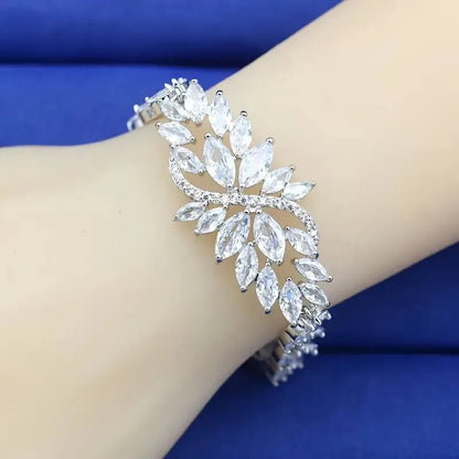 Copper bracelet with gold electroplating and micro-inlaid zircon stones in ice flower design