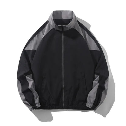 Men's black casual jacket with contrast stitching detail and side pockets for outdoor wear