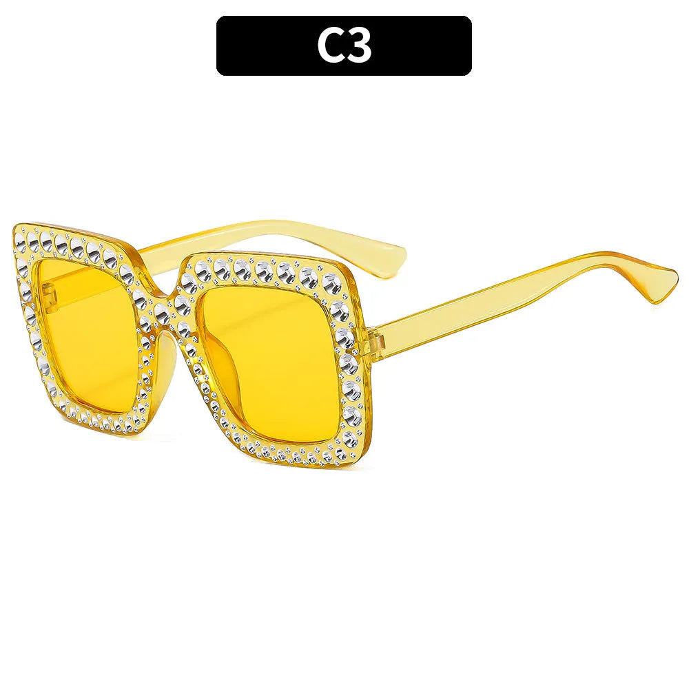Plastic sunglasses with fashion personality styling in various colour options including black frame and transparent tea frame
