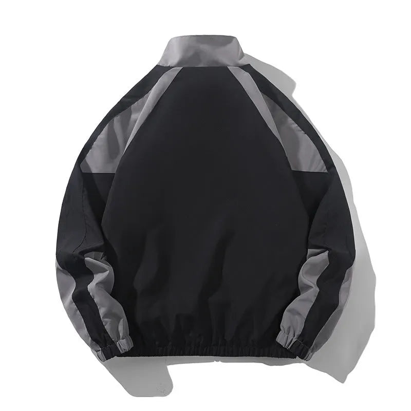 Men's black casual jacket with contrast stitching detail and side pockets for outdoor wear