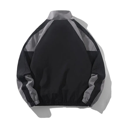 Men's black casual jacket with contrast stitching detail and side pockets for outdoor wear