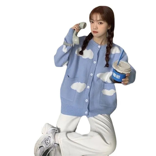 Blue cloud pattern women's spandex cardigan sweater with long sleeves and loose fit.