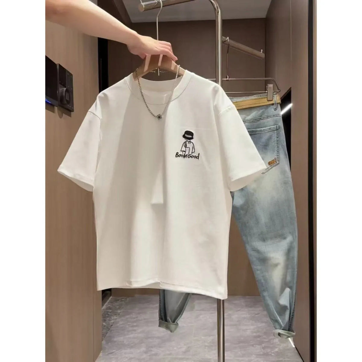 Men's white t-shirt with simple black cartoon print design, slim fit with short sleeves