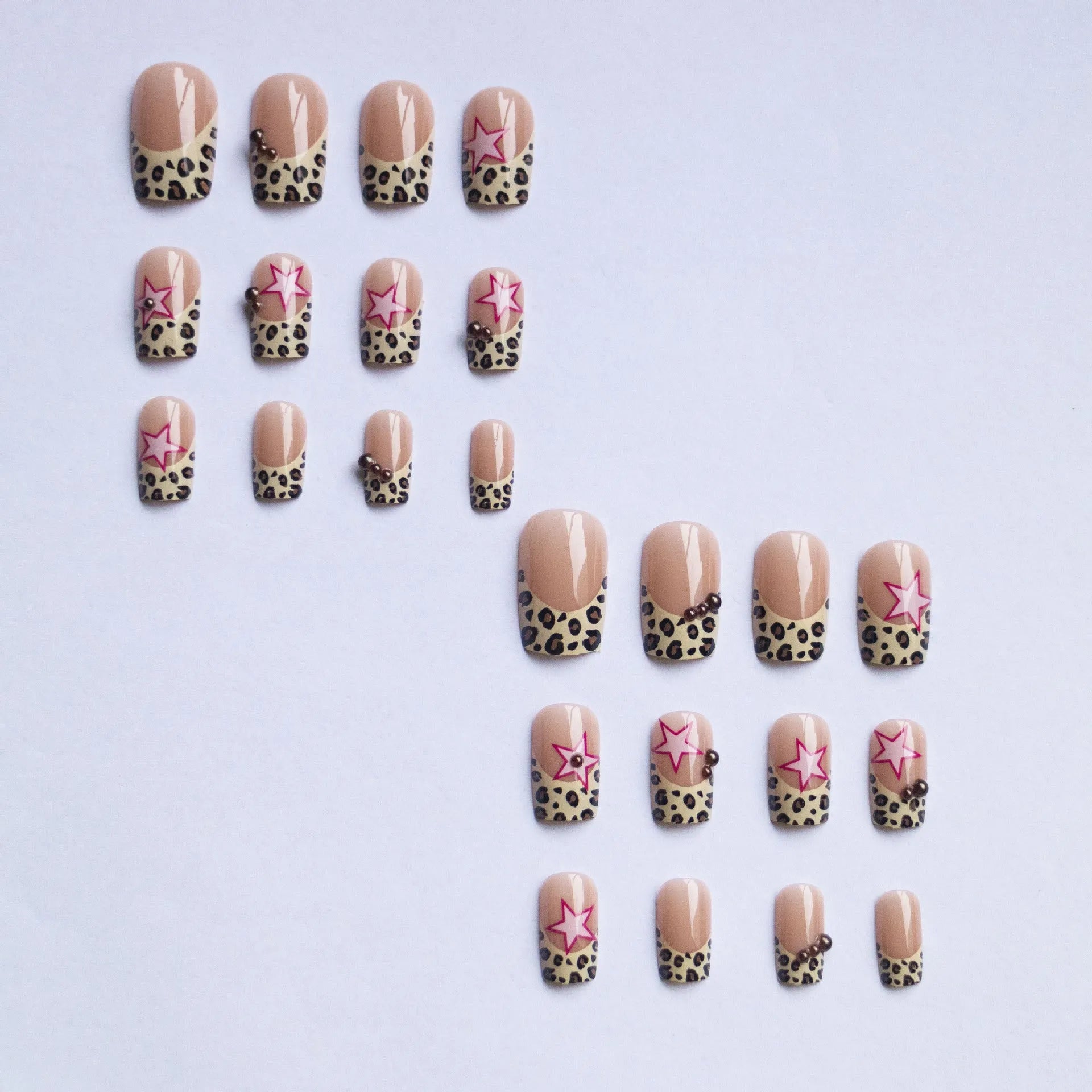 Leopard print French false nails with five-pointed star and pearl diamond accessories in retro European style