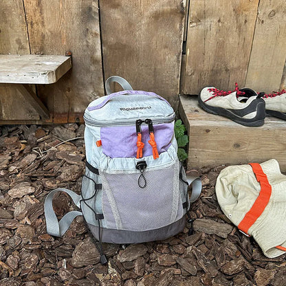 Waterproof nylon casual backpack in blue with curved shoulder straps and fold details