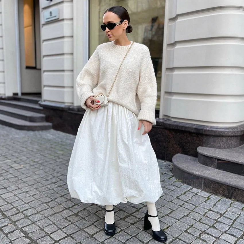 Women's long solid-colour cotton skirt shown in black and white.