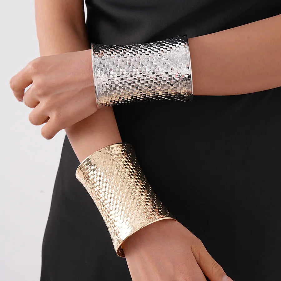 Women's vintage exaggerated oval metal bracelet in gold or silver tone, showing large 6.5 x 9.7 cm dimensions.