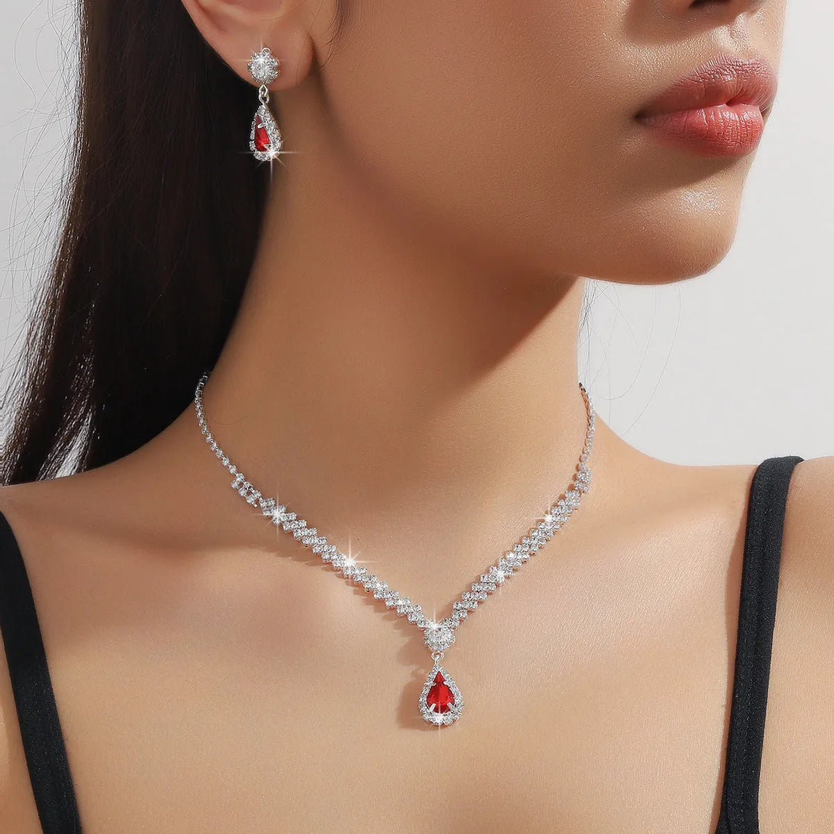 Rhinestone water drop shaped claw chain necklace and earrings jewellery set in selected colour