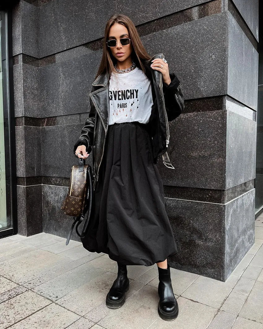 Women's long solid-colour cotton skirt shown in black and white.