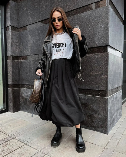 Women's long solid-colour cotton skirt shown in black and white.