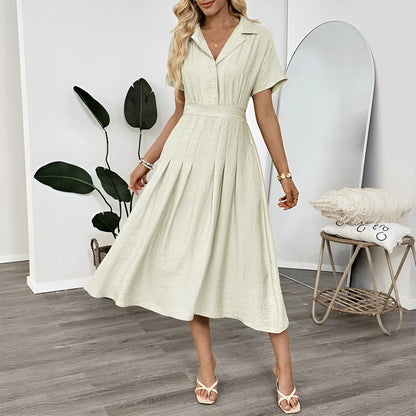 Light green women's shirt dress with lapel collar, waist tie fastening, and side pockets