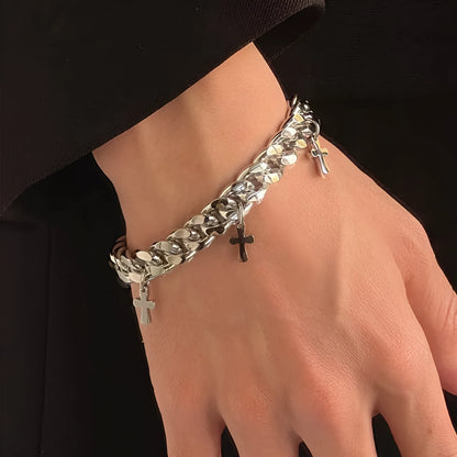 Men's titanium steel bracelet with a geometric cross design on a wrist.