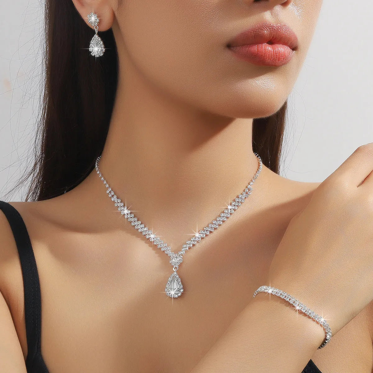 Rhinestone water drop shaped claw chain necklace and earrings jewellery set in selected colour