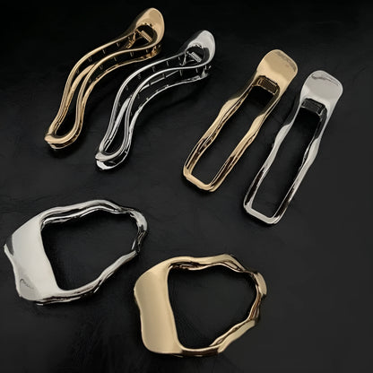 Women's zinc alloy hair barrettes in gold and silver with square, arc, and triangle shapes