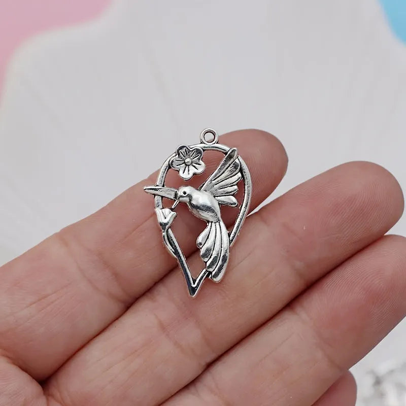 Alloy magpie pendant measuring 3.5cm with electroplated colour P234 finish for DIY jewellery