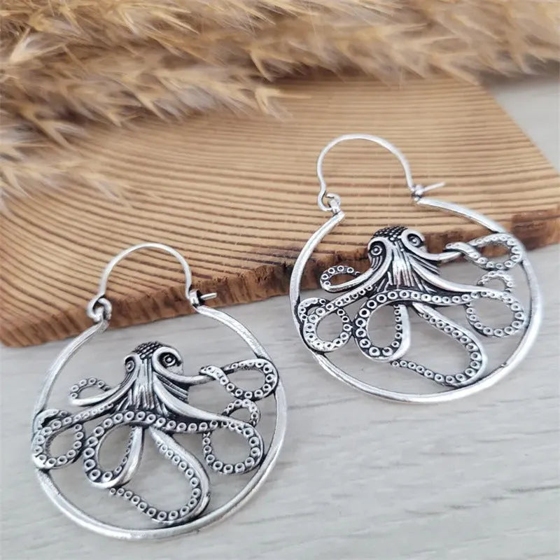 Vintage antique silver octopus earrings made from zinc alloy for unisex wear.