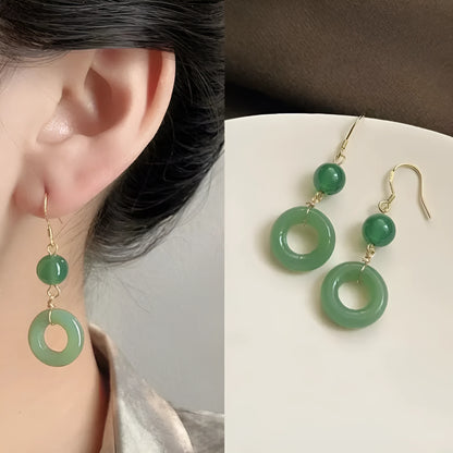 Pair of green geometric peace buckle earrings with Chinese cheongsam design inspiration