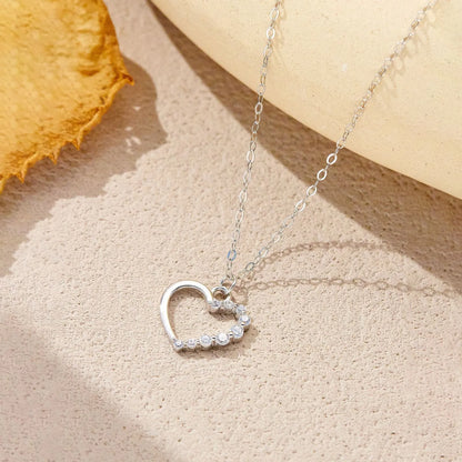 S925 sterling silver hollow heart necklace on a regular chain, available in gold or platinum plating.
