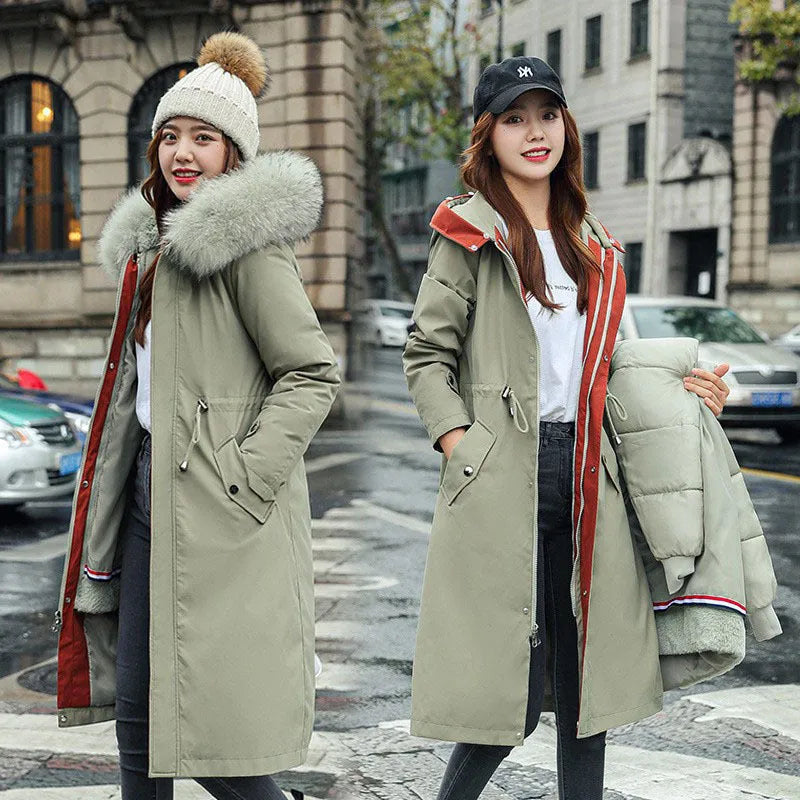 Women's long padded beige trench coat with a fleece lining, shown on a model.