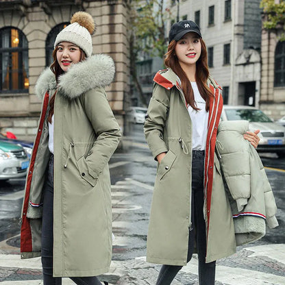 Women's long padded beige trench coat with a fleece lining, shown on a model.