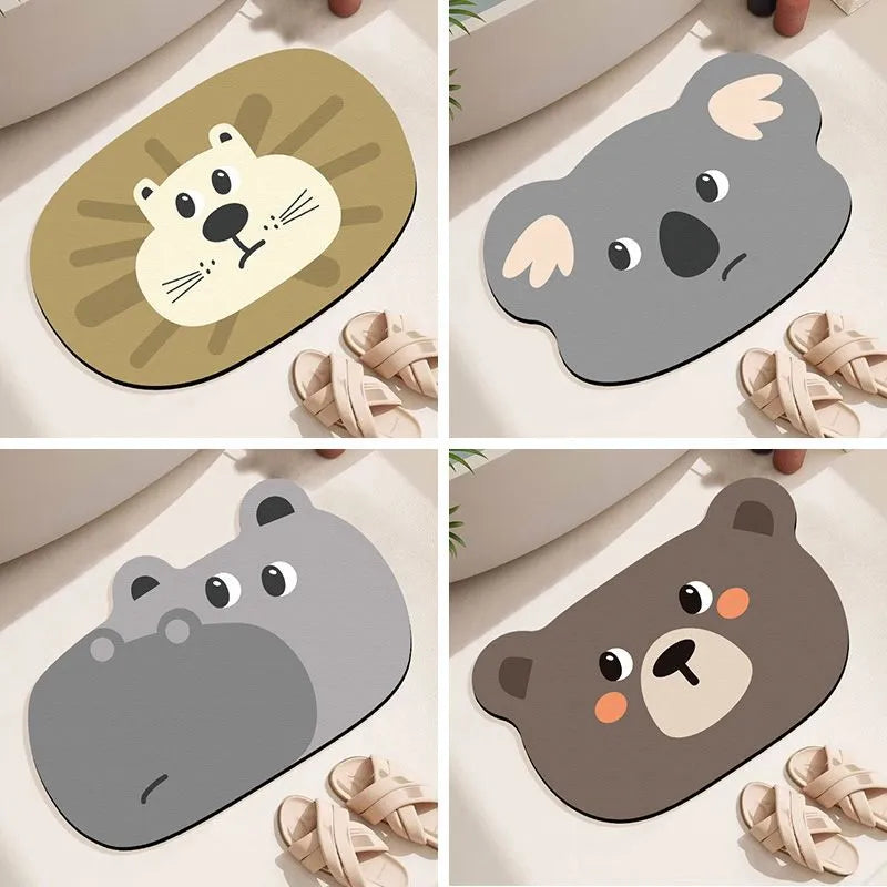 Alien-shaped diatomaceous earth bathroom mat with a cartoon hippo design on a tiled floor.