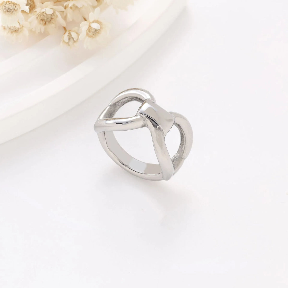 Women's titanium steel ring with hollow butterfly design and geometric pattern in gold colour