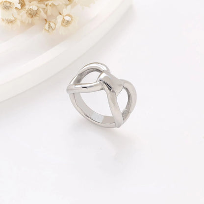 Women's titanium steel ring with hollow butterfly design and geometric pattern in gold colour