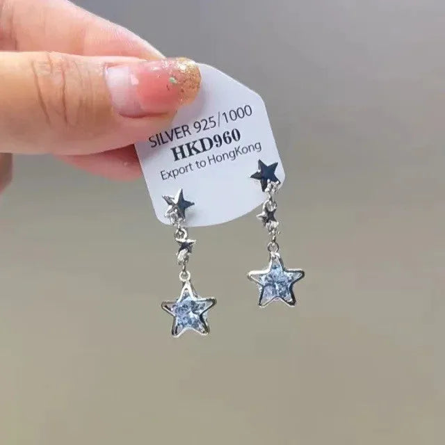 Geometric alloy ear clip with rhinestone stars, tassel and heart decoration for women