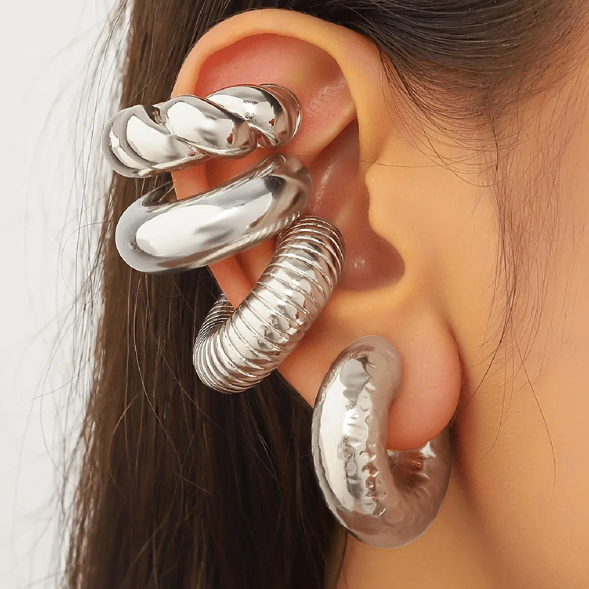 A set of four geometric-shaped clip-on earrings for women in gold or silver ccb.