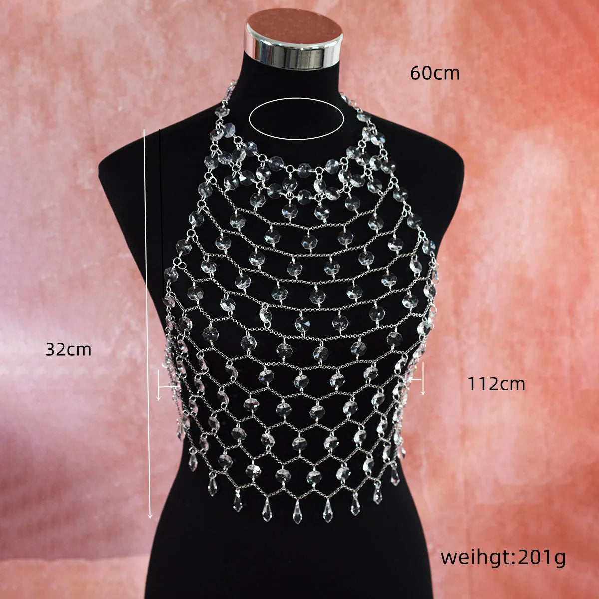 Clear acrylic crystal sequins body chain draped as a chest necklace.