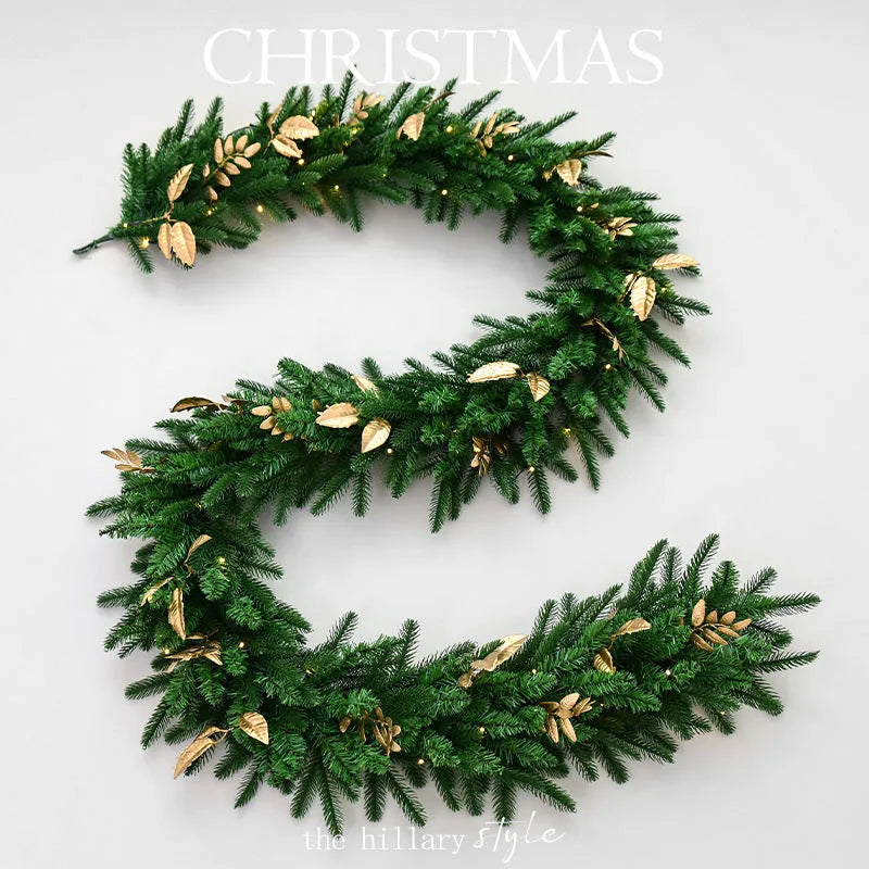 Long 2.7 metre Christmas PE rattan garland with velvet balls and integrated lights in golden leaf or red rattan colour.