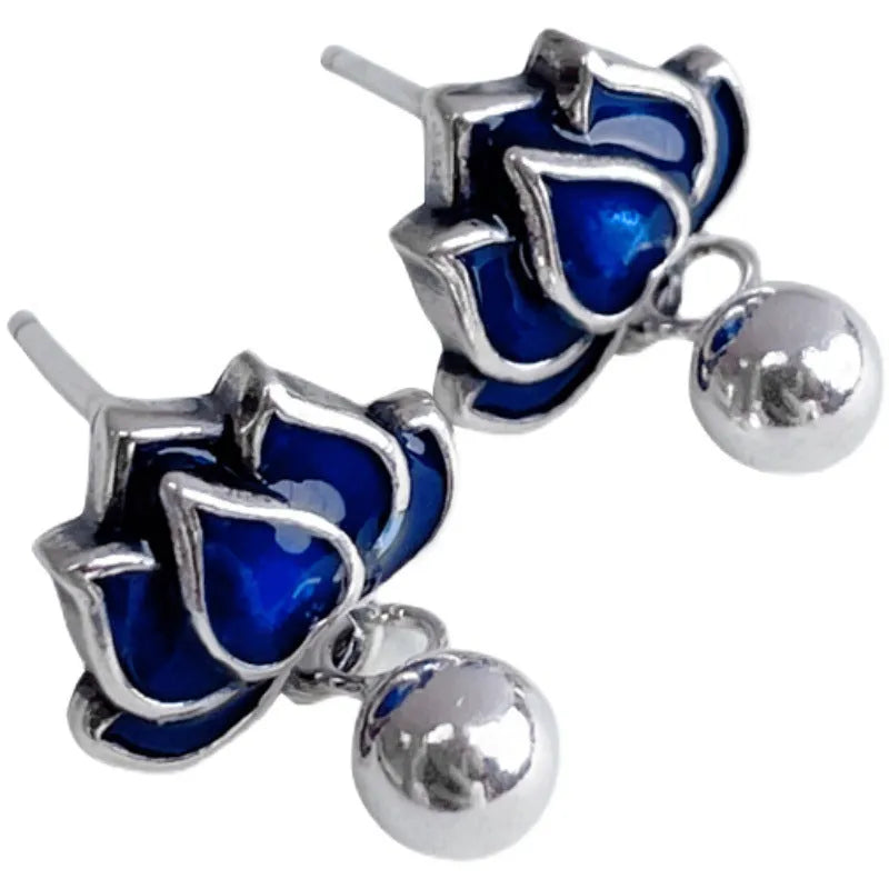 Blue lotus earrings with retro artistic seedpod tassel design, 1.2cm wide alloy studs