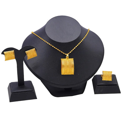 Golden women's bridal jewellery set showing copper necklace, earrings, and ring.