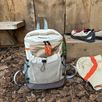 Waterproof nylon casual backpack in blue with curved shoulder straps and fold details