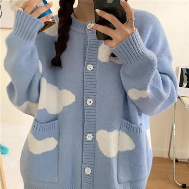 Blue cloud pattern women's spandex cardigan sweater with long sleeves and loose fit.
