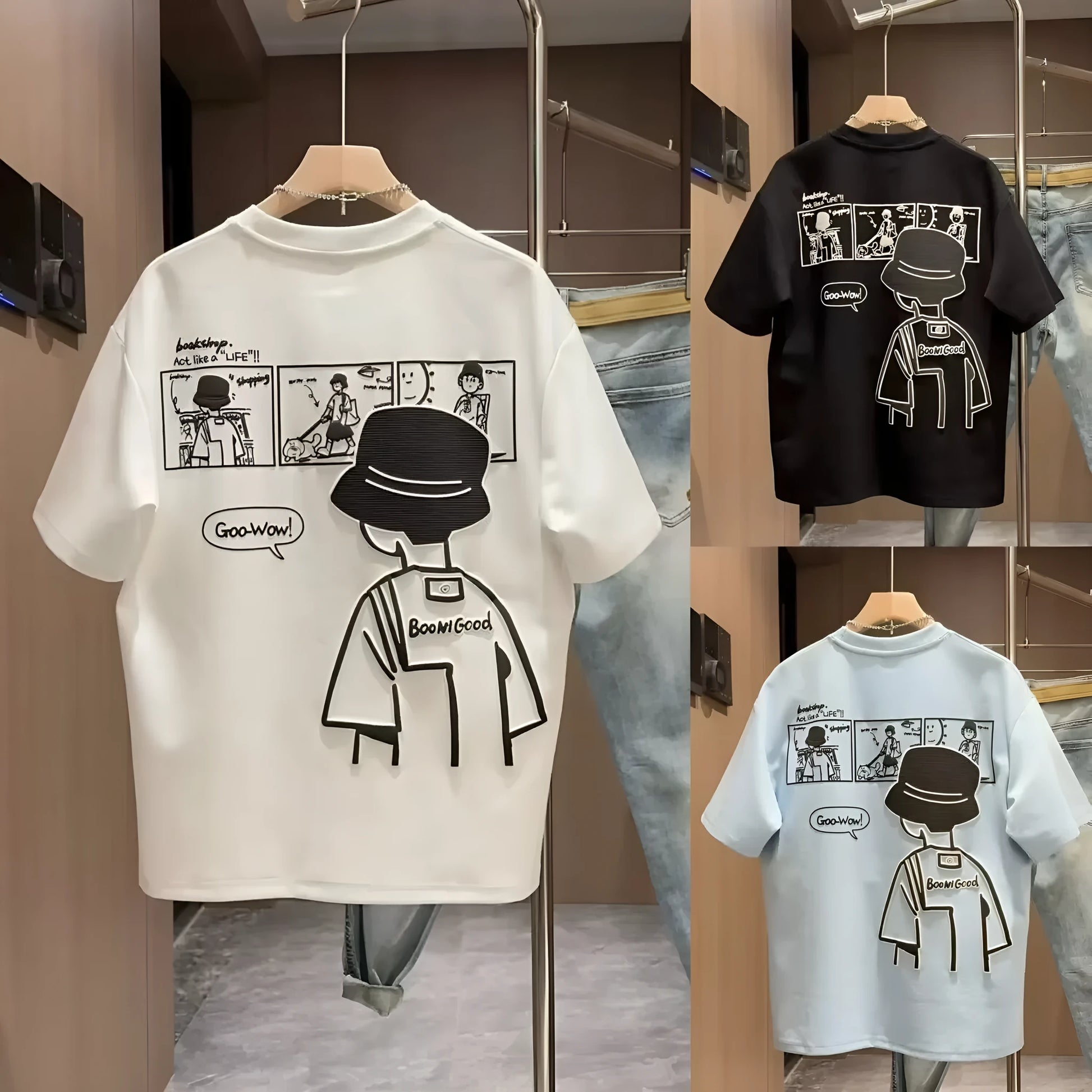 Men's black cotton short sleeve T-shirt featuring a cartoon print design on the front.