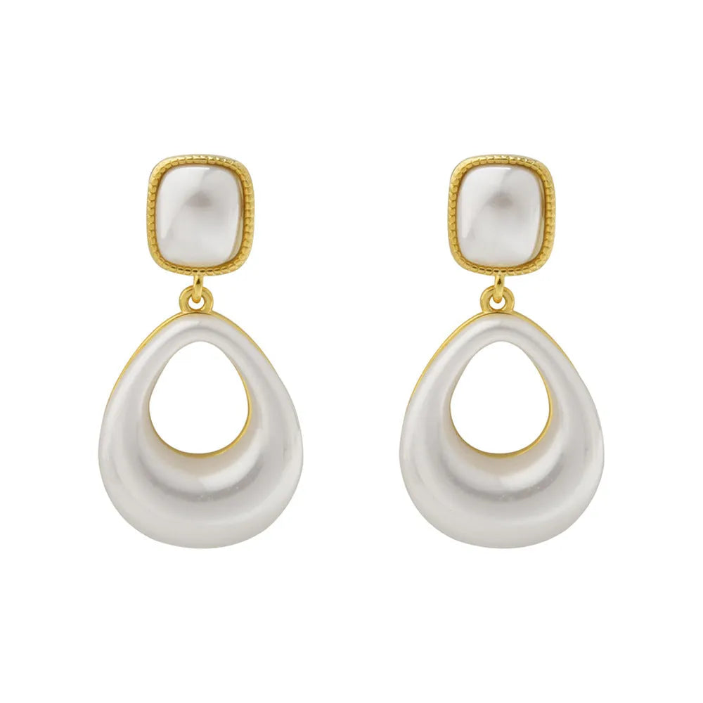 Gold drop earrings with imitation mabe pearl component and 14K gold plating