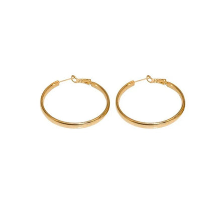 A pair of large, circular metal earrings in gold or silver colour, measuring 40mm.