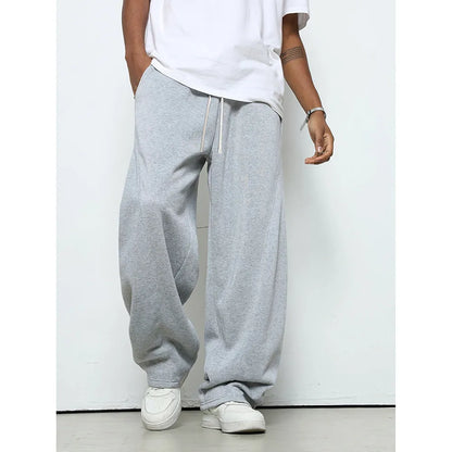 Men's straight leg casual trousers in grey with a micro-elastic drawstring waist.