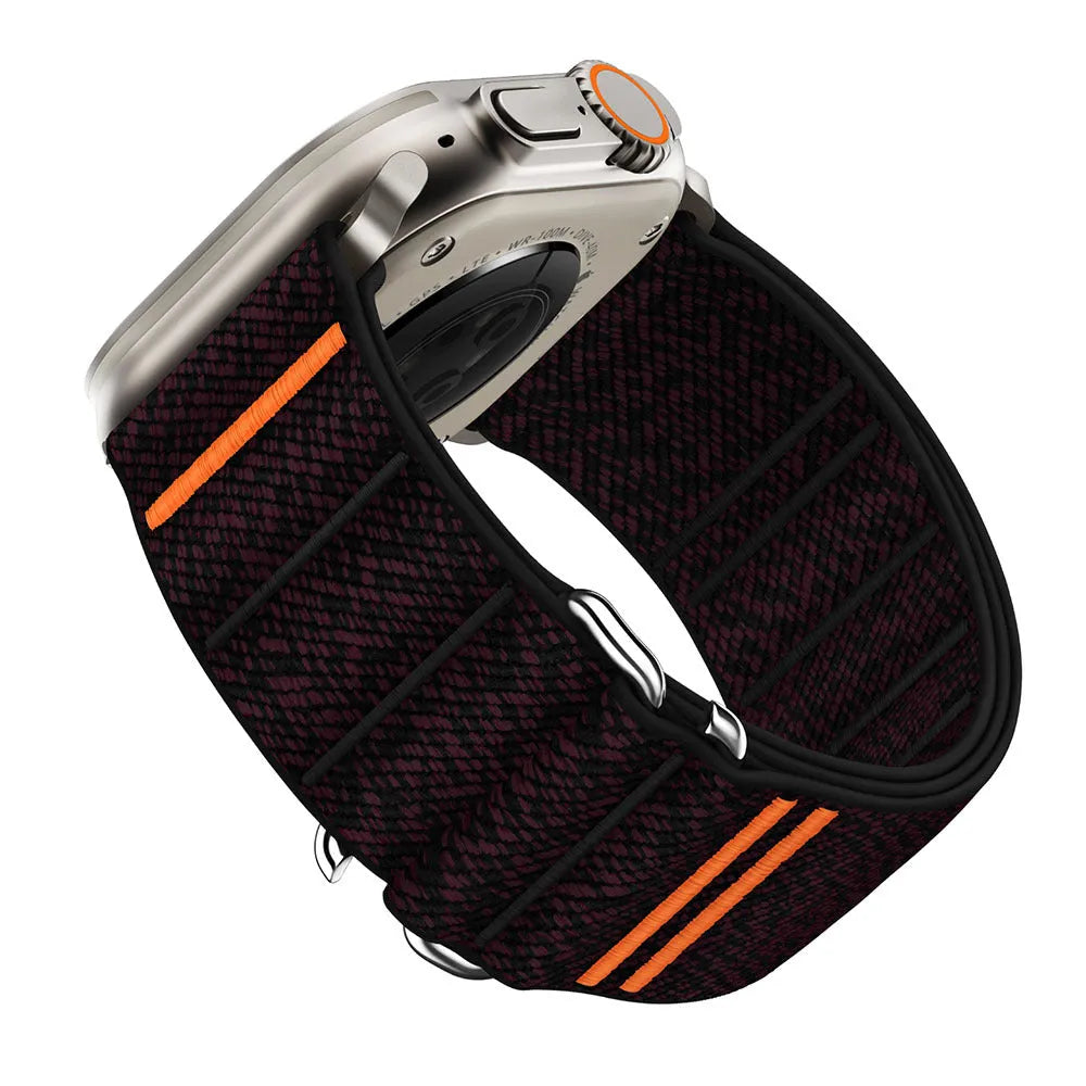 Elastic nylon Apple Watch band with stainless steel buckle shown in Army Green colour on a wrist.