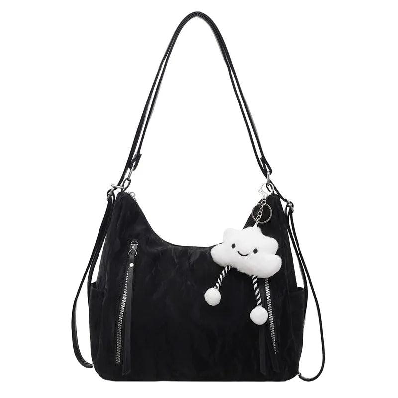 Women's soft PU backpack shoulder bag with pendant accessory in multiple colour options