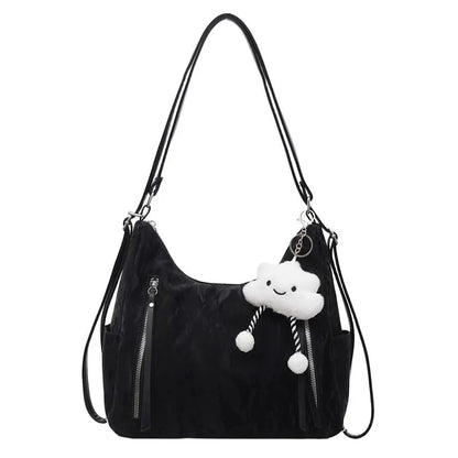 Women's soft PU backpack shoulder bag with pendant accessory in multiple colour options