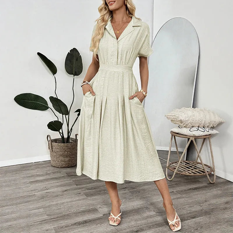 Light green women's shirt dress with lapel collar, waist tie fastening, and side pockets