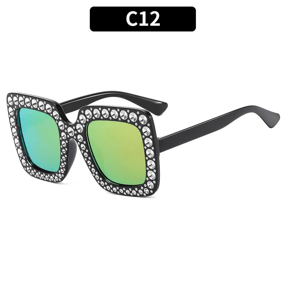 Plastic sunglasses with fashion personality styling in various colour options including black frame and transparent tea frame