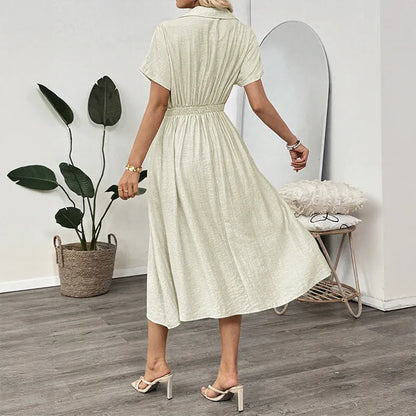 Light green women's shirt dress with lapel collar, waist tie fastening, and side pockets