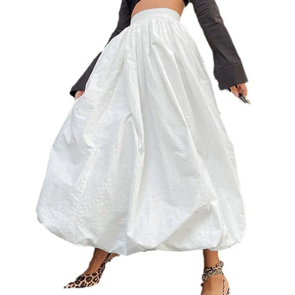 Women's long solid-colour cotton skirt shown in black and white.