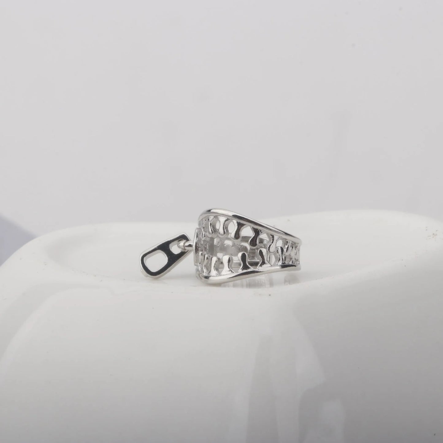 Copper geometric ear clip with zipper design and bone clip fastening