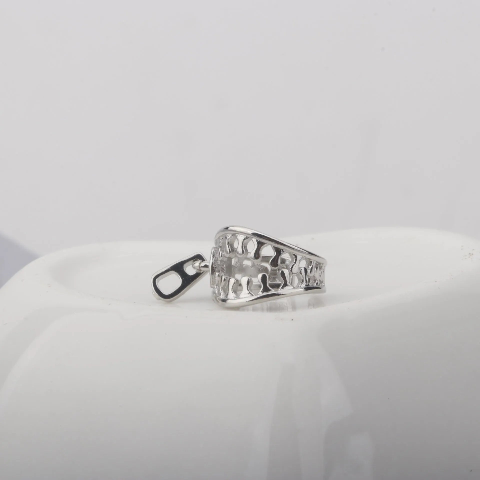 Copper geometric ear clip with zipper design and bone clip fastening
