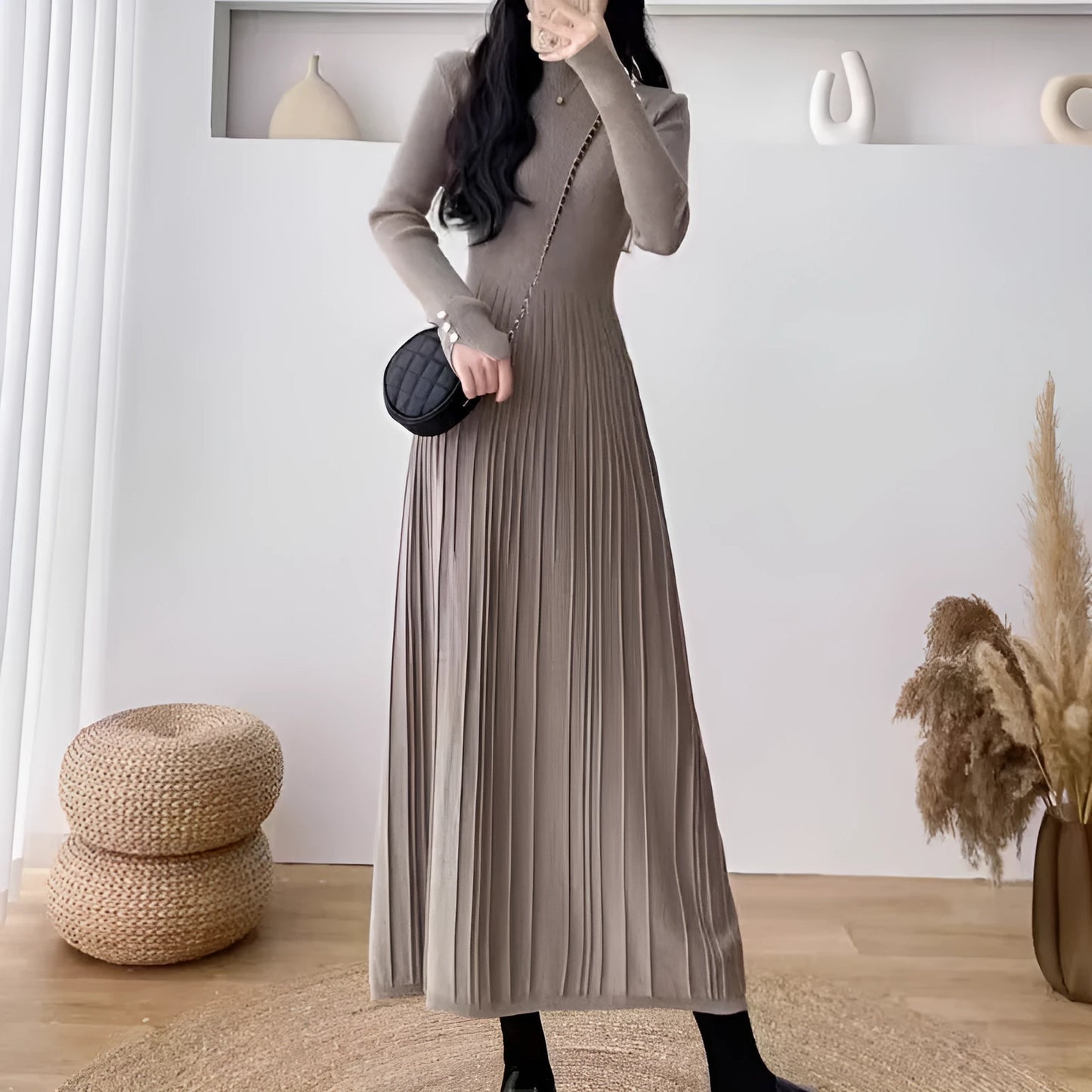 Women's beige high-waisted A-line pullover dress with a knitted texture, midi length.
