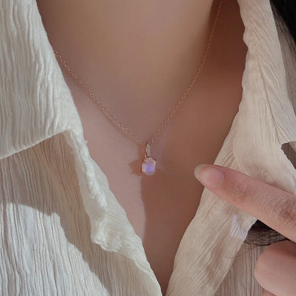 Geometric crystal moonstone pendant on an adjustable sterling silver necklace chain.